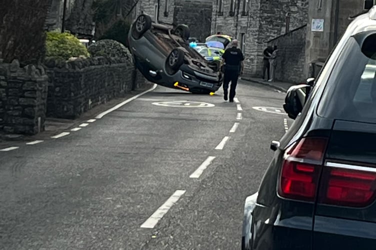 North Road in Timsbury was closed after a car flipped onto its roof.