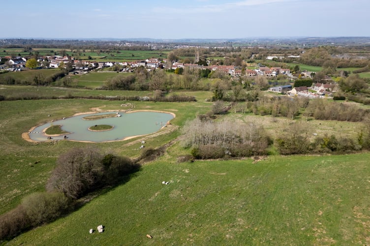 Aaron Taylor-Johnson's property in Somerset where they have excavated a large lake. Somerset. April 4 2025. Release date April 8 2025. A leading contender to be the 'next James Bond' won over his neighbours with his pond plan - after being credited with 'bringing back birds'. Aaron Taylor-Johnson and his film director wife Sam had faced public anger over plans to excavate a huge lake in the grounds of their historic Somerset home. But retrospective permission was granted papers show - and an inspection carried out last week has given the go ahead for the pond to continue operating with 'no issues' raised. And some of the couple's closest neighbours say the British actor - widely tipped to become the new 007 - has done wonders in bringing back birds to his farmland in the Mendip hills.