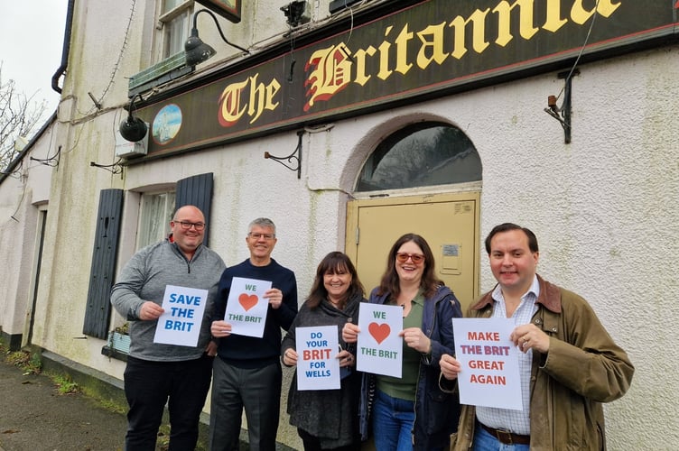 The East Wells Community Benefit Society outside The Britannia Inn on Bath Road, Wells, Somerset. Photo released April 8 2025. A community group is trying to raise £450K to buy the only pub left in their neighbourhood.The Britannia Inn closed in June 2021 when landlords Rob and Karen Rouse retired after 35 years. It has been empty ever since, and is currently for sale with the Caldecotte Group for £300,000.The East Wells Community Benefit Society (CBS) was set up last year with the aim of buying the pub and re-establishing it at the heart of the local community.
