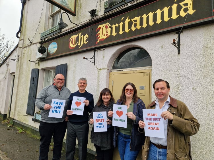 The East Wells Community Benefit Society outside The Britannia Inn on Bath Road, Wells, Somerset. Photo released April 8 2025. A community group is trying to raise £450K to buy the only pub left in their neighbourhood.The Britannia Inn closed in June 2021 when landlords Rob and Karen Rouse retired after 35 years. It has been empty ever since, and is currently for sale with the Caldecotte Group for £300,000.The East Wells Community Benefit Society (CBS) was set up last year with the aim of buying the pub and re-establishing it at the heart of the local community.