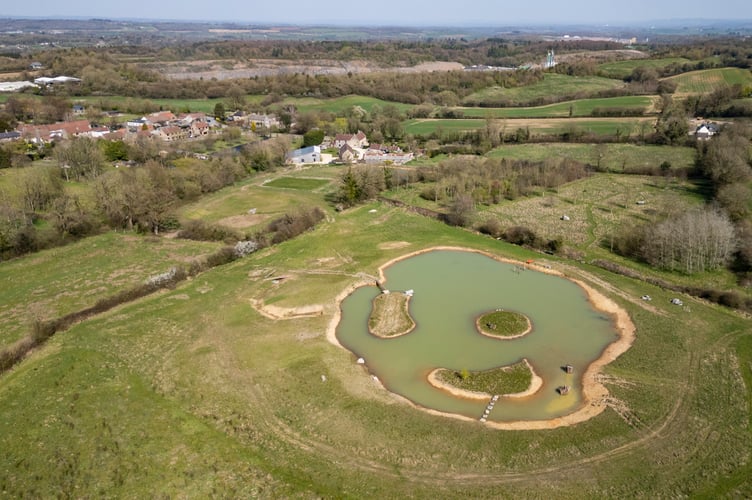 Aaron Taylor-Johnson's property in Somerset where they have excavated a large lake. Somerset. April 4 2025. Release date April 8 2025. A leading contender to be the 'next James Bond' won over his neighbours with his pond plan - after being credited with 'bringing back birds'. Aaron Taylor-Johnson and his film director wife Sam had faced public anger over plans to excavate a huge lake in the grounds of their historic Somerset home. But retrospective permission was granted papers show - and an inspection carried out last week has given the go ahead for the pond to continue operating with 'no issues' raised. And some of the couple's closest neighbours say the British actor - widely tipped to become the new 007 - has done wonders in bringing back birds to his farmland in the Mendip hills.