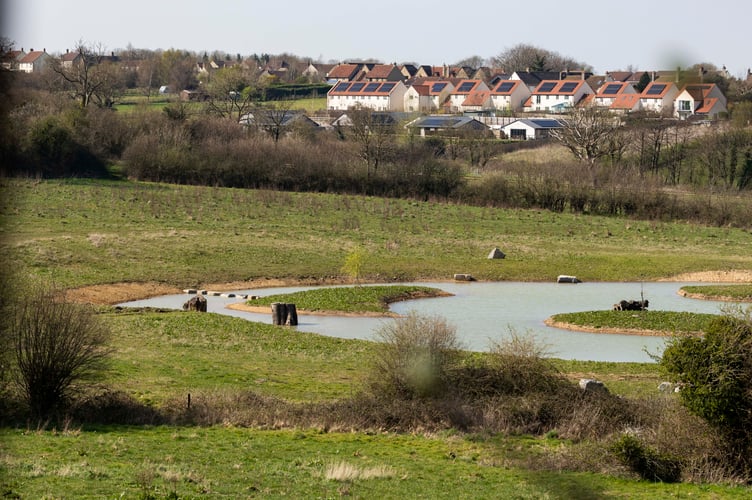 Aaron Taylor-Johnson's property in Somerset where they have excavated a large lake. Somerset. April 4 2025. Release date April 8 2025. A leading contender to be the 'next James Bond' won over his neighbours with his pond plan - after being credited with 'bringing back birds'. Aaron Taylor-Johnson and his film director wife Sam had faced public anger over plans to excavate a huge lake in the grounds of their historic Somerset home. But retrospective permission was granted papers show - and an inspection carried out last week has given the go ahead for the pond to continue operating with 'no issues' raised. And some of the couple's closest neighbours say the British actor - widely tipped to become the new 007 - has done wonders in bringing back birds to his farmland in the Mendip hills.