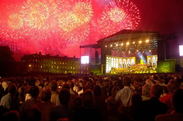 FILE PHOTO - The Three Tenors, Placido Domingo, Jose Carreras and Luciano Pavarotti perform in front of the Royal Crescent, Bath. Photo released April 2025. Residents on one of Britain's most ionic streets say they love living there - but tourists sometimes just 'walk in their homes'. The Royal Crescent is a row of 30 Grade I Listed terrace houses laid out in a sweeping crescent in the city of Bath, Somerset. It was built between 1767 and 1775 and has become one of Britain's most beautiful landmarks appearing in countless period dramas like Bridgerton. The street attracts millions of tourists every year keen to get a photos of its stunning multi-million pound homes.
