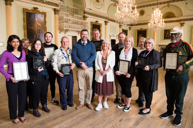 The Community Awards winners with (middle front) Councillor Kevin Guy, Council Leader and Councillor Karen Walker, Council Chair.