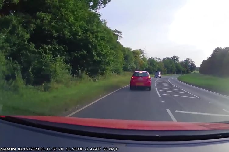 Video grab of the dashcam footage shows a minibus driving on the wrong side of the road colliding head-on with a car - leaving three people seriously injured.The Ford Transit minibus can be seen on the A30 Sherborne Road before crashing head-on with a Toyota Yaris - with a Volkswagen Polo subsequently colliding behind them both. Photo released April 17 2025.Three people were taken to hospital with serious injuries following the collision.Benjamin Charles Foster, 35 and of Yeovil in Somerset, was driving the red Ford Transit minibus.