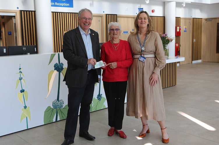 Mike Taylor and Doctor Emma with Teresa Hawkins.