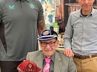 100-year-old Stanley presented with special 1865 Club legacy cap 