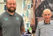 100-year-old Stanley presented with special 1865 Club legacy cap