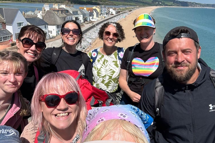Chilcompton’s Jade Preddy (in red sunglasses) joined midlife coach Lou Featherstone and a group of hikers in Devon ahead of Lou’s UK tour, which includes a weekend of self-empowerment events in Bristol and Ebbor Gorge this May.