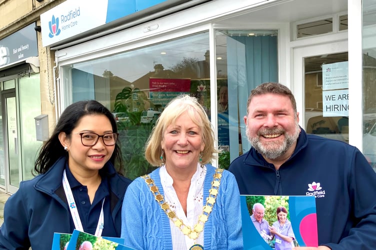 Cllr Karen Walker (centre) with Radfield Home Care Director Christina Maria Tevenio-Steiner (left) and outside their offices in Oddown, Bath.