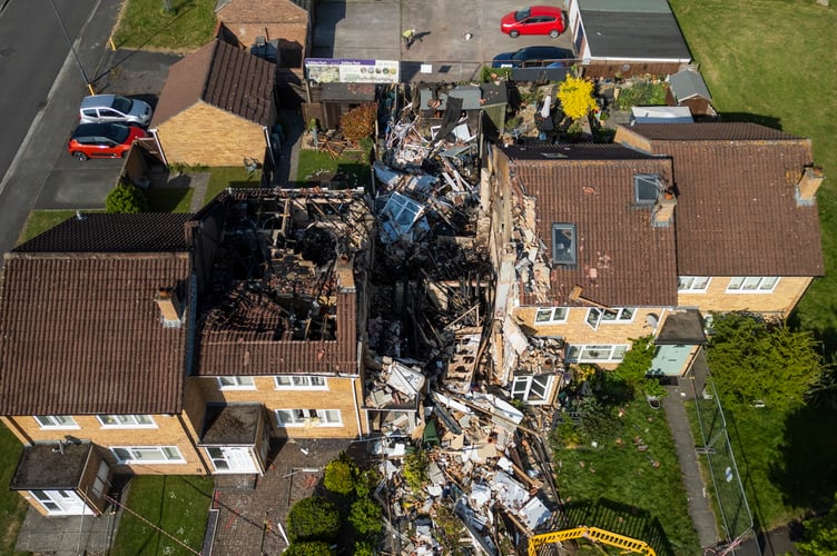 The aftermath of a gas explosion in Yate. It is reported that all the houses in the terraced row will have to be demolished due to damage from the explosion. Yate, South Gloucestershire. May 01 2025. A family living next door to a house which blew up in a suspected gas explosion say their home is to be knocked down as a result. Rich Cainey, 35, a repair worker for Airbus, lived with parents, Rob and Deb, both 60, at a property next to the blast home in Yate, Glos. It was was destroyed in an explosion on Tuesday which saw four people hurt - as witnesses say it is a 'miracle' no-one was killed. Rich say insurers are saying his and other homes on the row will have to be demolished.
