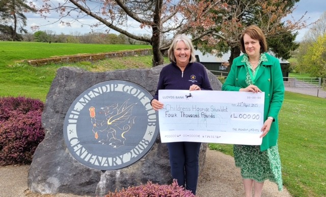 The 2024 Mendip’s Lady Captain Ann Padley presents a cheque for £4,000 raised during her captaincy year to her chosen charity Childrens Hospice South West