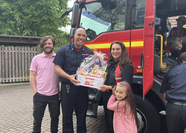 Firefighters from Kingswood joined residents and their families for a BBQ garden party.