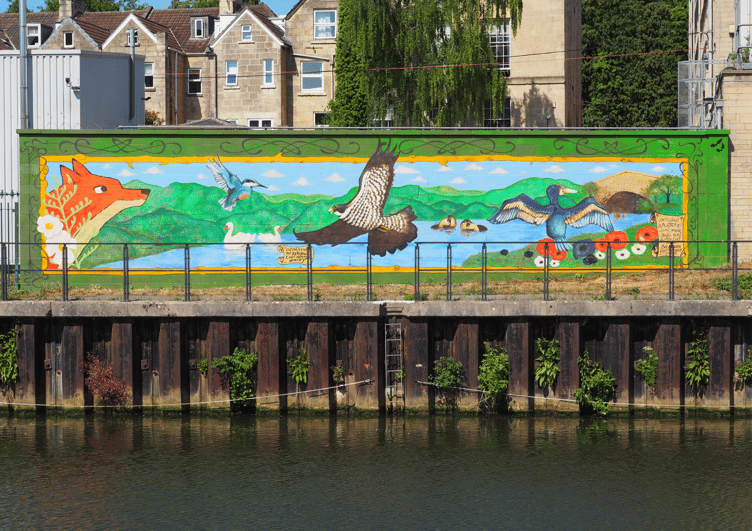 Young artists in Bath celebrate local wildlife with a vibrant mural on the River Avon, part of the Bath River Line's improvements.