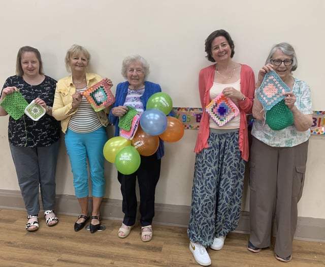 Yarnbombers celebrate a member's 95th birthday with special knit event