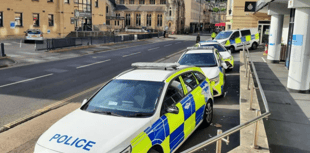Man arrested in connection to criminal damage to four police vehicles