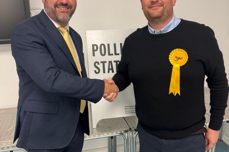 Council leader Kevin Guy (left) and Lib Dem Mendip byelection winner Simon McCombe (left) at the count on Thursday night.