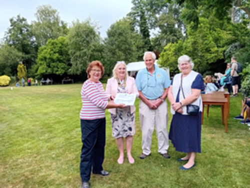 Pictured above are  Anne Oakes of the Blue House, Sheridan Curtis, President of the Inner Wheel, Jim Dowling of the Blue House, and Pam Brewster, secretary of the Inner Wheel.
