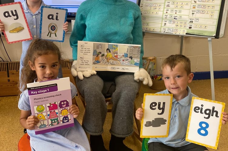 Year 1 pupils with the puppet Granny Fantastic