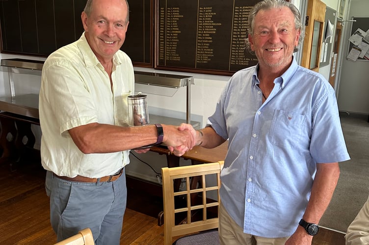 Seniors Captain Paul Wood, left, receiving the Tidworth Trophy