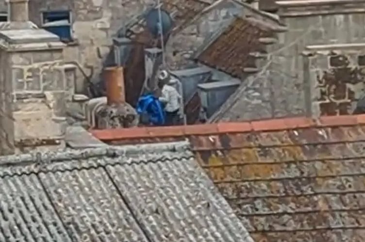 Police would like to identify a man who was seen on roof space above The Corridor shopping centre, in Bath
