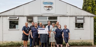 Charity receives £500 donation at event celebrating friendship