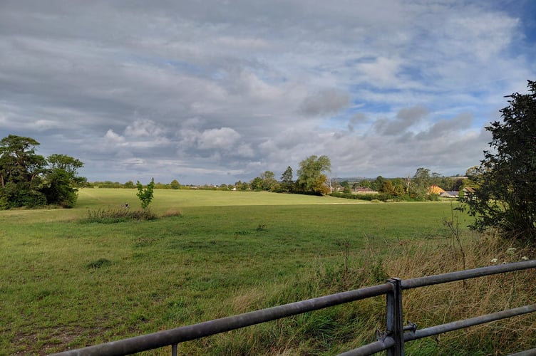 Planned site of 620 homes, care home, commercial space & primary school on A371 Cannard's Grave Road in Shepton Mallet.