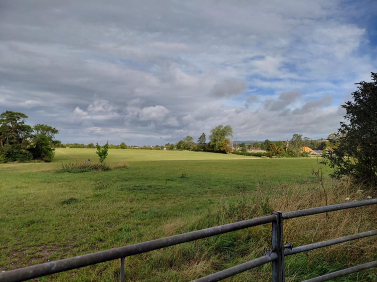 Planned site of 620 homes, care home, commercial space & primary school on A371 Cannard's Grave Road in Shepton Mallet.