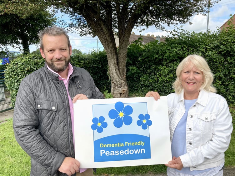 Cllr Gavin Heathcote (left) and Cllr Karen Walker (right) are encouraging Peasedown businesses and community groups to ‘make a pledge for dementia’ as part of World Alzheimer’s Month this September.