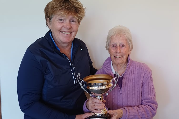 Mary Lock is presented with the Sally Lock Trophy by Lady Captain Sue Marshall
 
