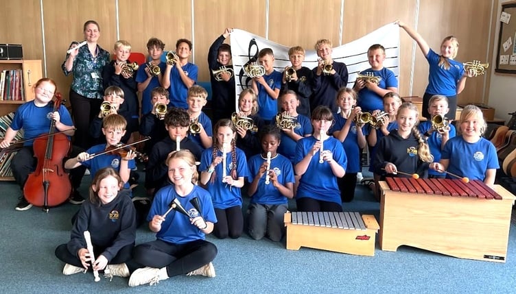 Peasedown St John Primary School Year 6 pupils with the new musical instruments.