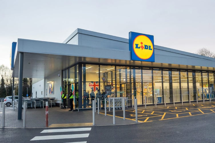 Lidl reveals plans to expand its store in Midsomer Norton, featuring solar panels and EV chargers, inviting community feedback.