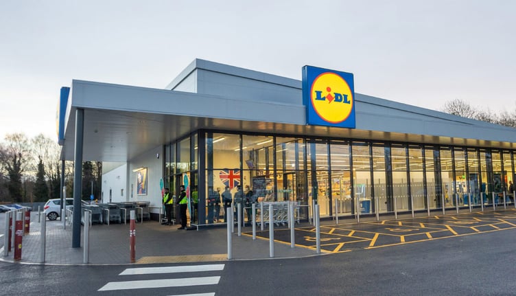 Lidl reveals plans to expand its store in Midsomer Norton, featuring solar panels and EV chargers, inviting community feedback.