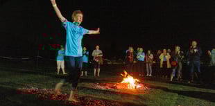 Patients and family brave a firewalk for charity 