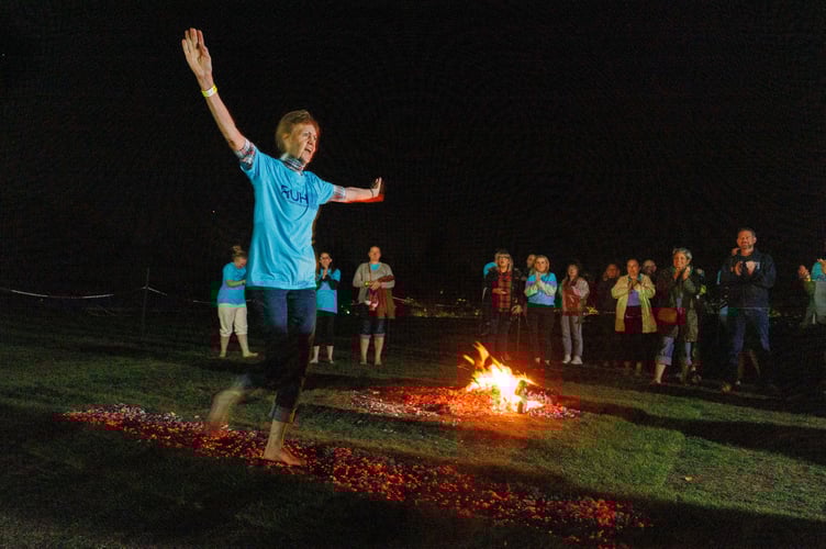 29 people took part in stepping over the coal, including former and current patients, family members of patients and colleagues from Dotty Ink.