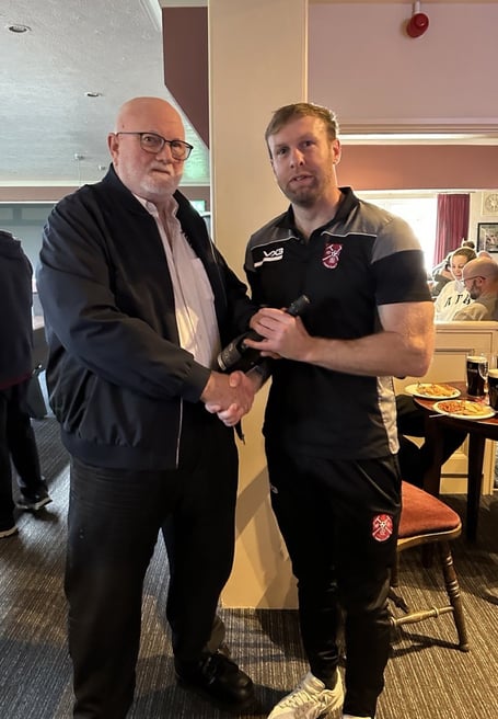 Paulton Rovers player of the match Chris Peck receives his award sponsored by VIATEC LIMITED of Westfield from Football Chairman Dave Bissex.