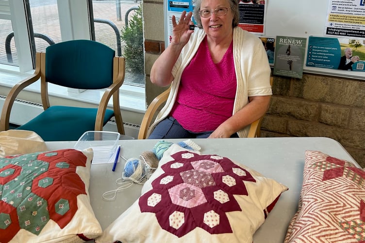 Mrs Liz Barge with her baby patchwork quilts and cushions in aid of the Friends of Somer Valley Medical Group