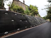 Partially collapsed embankment stabilised