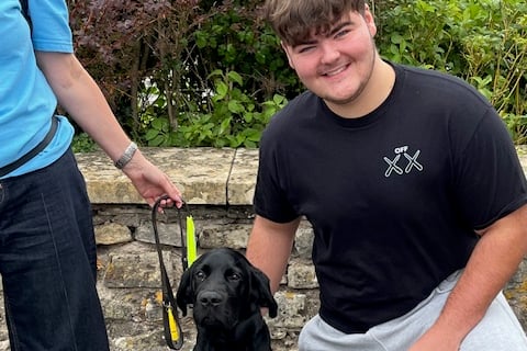 Brother Kyle with Luke the Labrador
