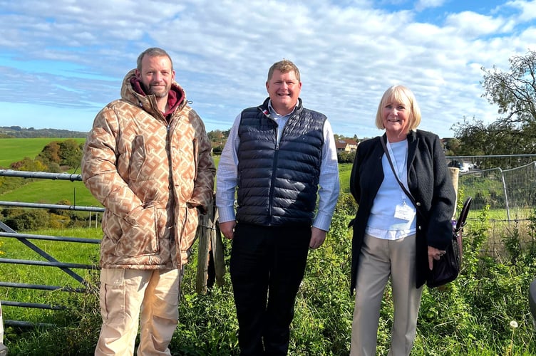 Cllr Gavin Heathcote (left) and Cllr Karen Walker (right) with Curo’s Head of Construction Paul Fackrell (centre) in Greenlands Road, Peasedown St John, on a recent site visit.