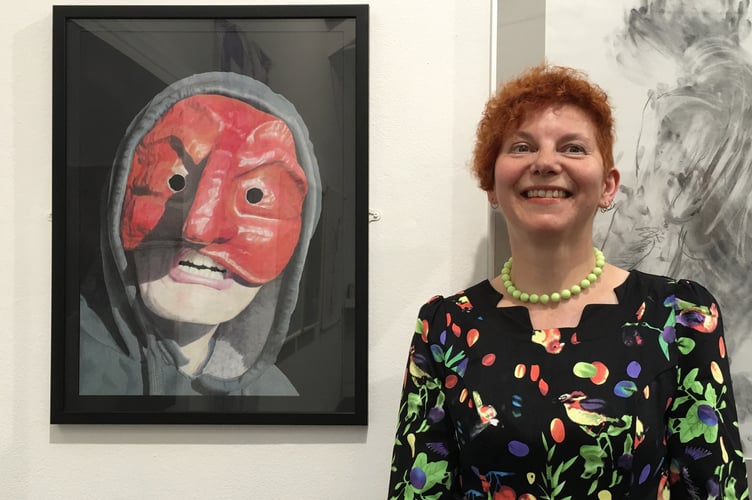 Radstock artist Jo Barber with one of her drawings