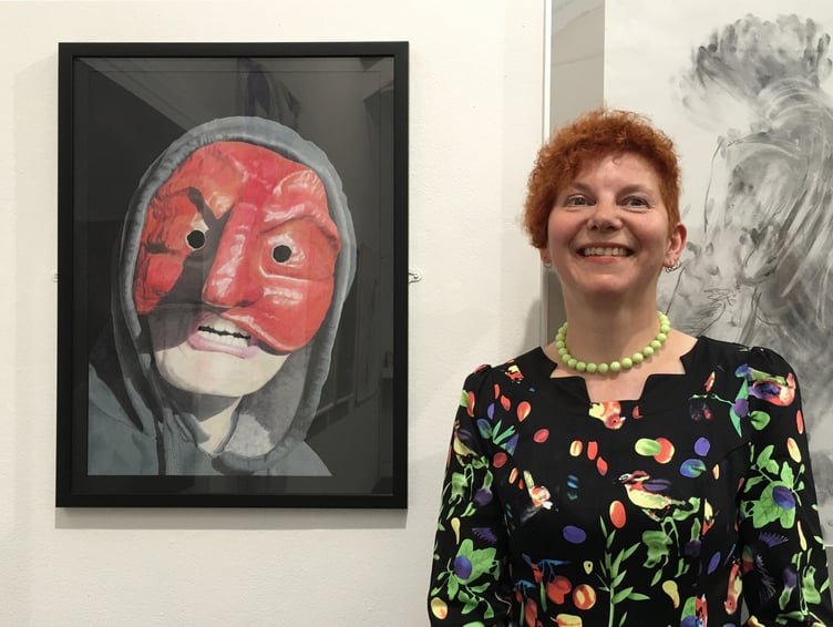 Radstock artist Jo Barber with one of her drawings