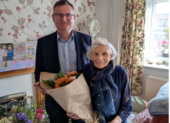 Don Morris, CEO of Radstock Co-operative Society, visited Gwendoline Chivers for her birthday