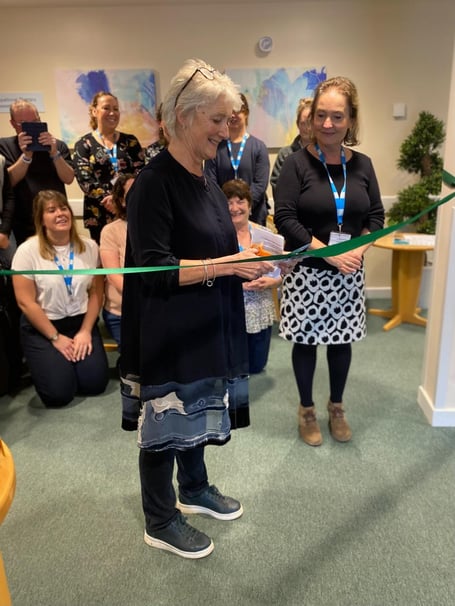 Councillor Alison Born, cabinet member for adult services, marks the opening of the Combe Lea OT Assessment Centre with a ribbon cutting, alongside Alison Thomas, principal OT at B&NES Council, and OT colleagues