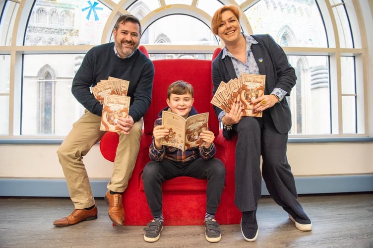 L-R: Councillor Kevin Guy with Leo (aged 10) and Zhenya Shkil