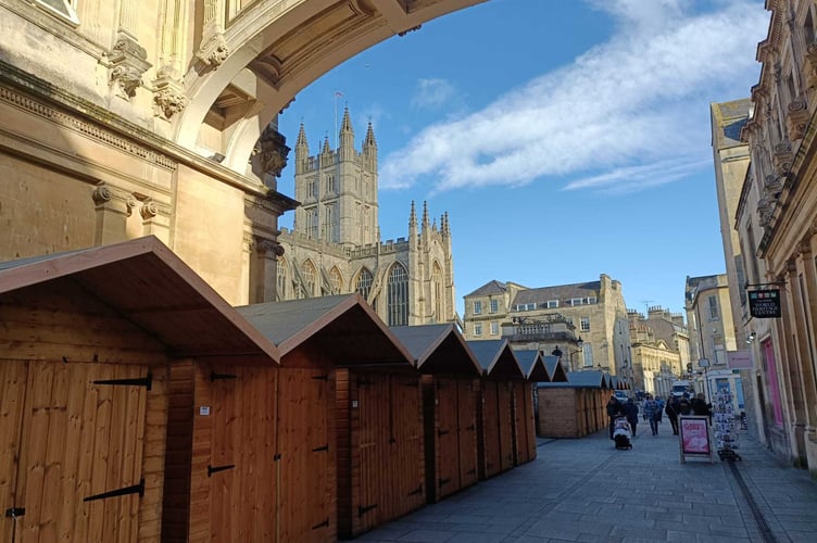 Stalls set up along York Street, with Bath Abbey visible behind them