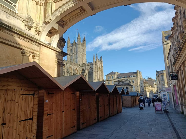 Stalls set up along York Street, with Bath Abbey visible behind them