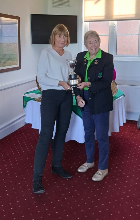 Susie Howe collect the County Grass Roots Trophy