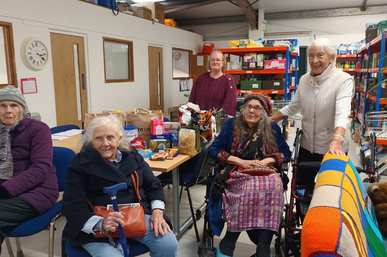 Residents of Rossetti House care home in Frome are helping local families by collecting donations for the town's food bank, partnering with Fair Frome.