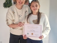 MP hosts hot chocolate morning with Christmas card competition winners